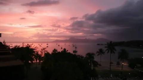 Sunset behind Moorea Stock Footage 11201012