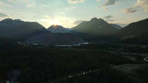 Sunset behind a Mountain, Aerial Drone View Stock Footage 289486030