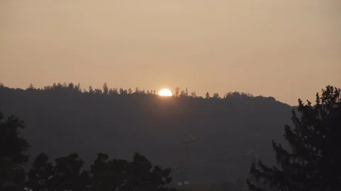 Sunset behind the mountain line. Time lapse Stock Footage 95720666