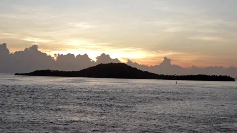 Sunset Behind the Mountain with Ocean View 動画素材 242141097