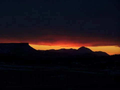 Sunset behind mountain Foto stock