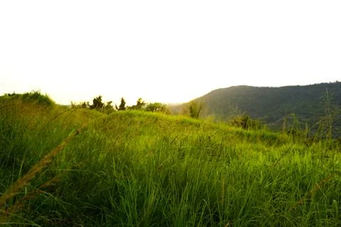 Sunset behind the mountain Stock Photos