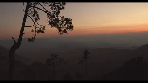 A sunset behind the mountain ridges Stock Footage 292735479