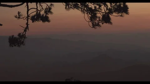 A sunset behind the mountain ridges Stock Footage 292735644