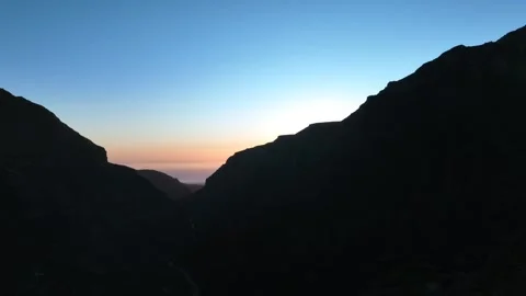 Sunset Behind Mountain Silhouette with Vibrant Clear Sky – Gran Canaria Stock Footage 309949167