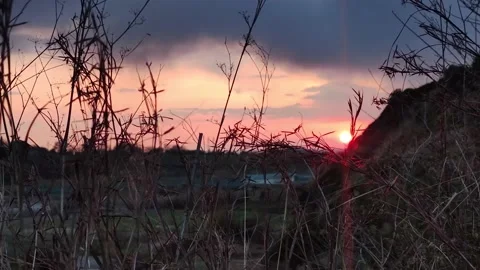 Sunset behind the mountains.  Stock Footage 194363231