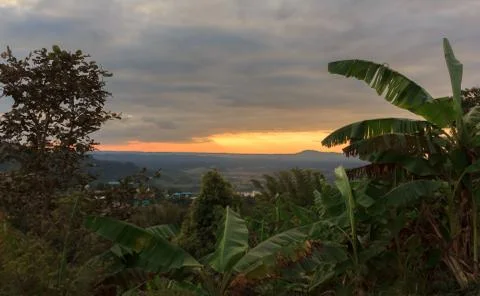 Sunset behind the mountains Stock Photos