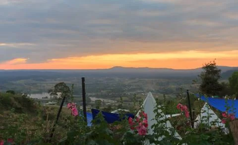 Sunset behind the mountains. Stock Photos
