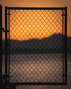 Sunset behind the mountains Stock Photos