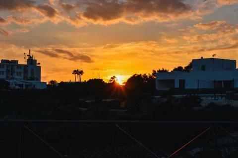 Sunset behind the mountains Stock Photos