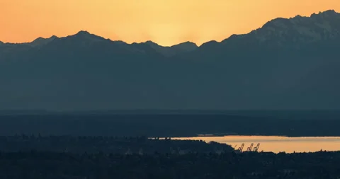 Sunset behind mountains time lapse Stock Footage 165240082