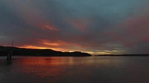 Sunset Behind Mountains By The Water Stock Footage 63496696