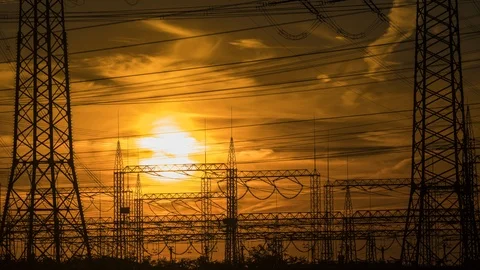 Sunset behind power poles Stock Footage 108685476