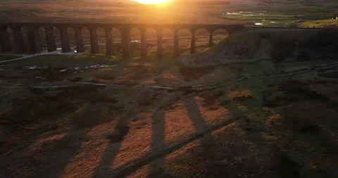 Sunset behind Ribblehead viaduct Stock Footage 297236997