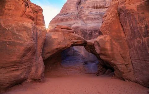 Sunset Behind Sand Dune Arch, Arches National Park, Utah Stock Photos