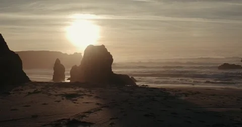 Sunset behind a sea stack on the northern california coast Stock Footage 256593553