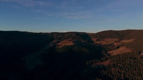 Sunset behind snow capped mountains Video stock 329405710