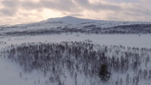 Sunset behind snowy mountain Stock Footage 73044858