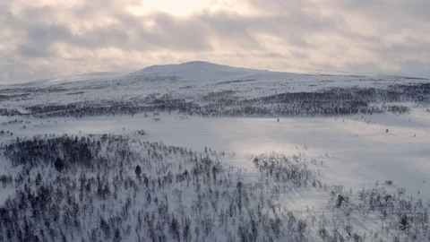 Sunset behind snowy mountain Stock Footage 73058831