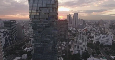 Sunset Behind Thailand's Tallest Building, Aerial Drone Approach Shot Stock Footage 76033282