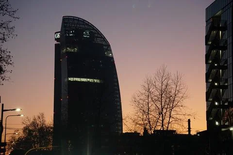 Sunset behind a tower in Milan Stock Photos
