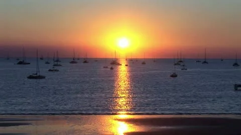 Sunset behind yachts Stock Footage 11344390