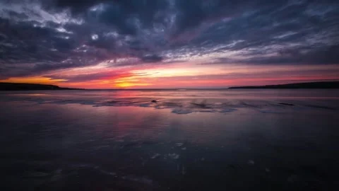 Sunset Below Skara Brae as the Tide Comes in in Sandwick Orkney 4K Time Laps Stock-Footage 253322735