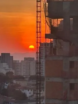 Sunset Between Buildings Stock Photos