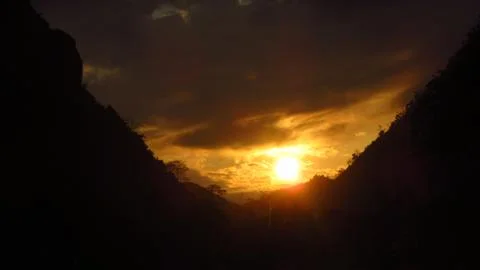 Sunset Between the Mountains Stock Photos