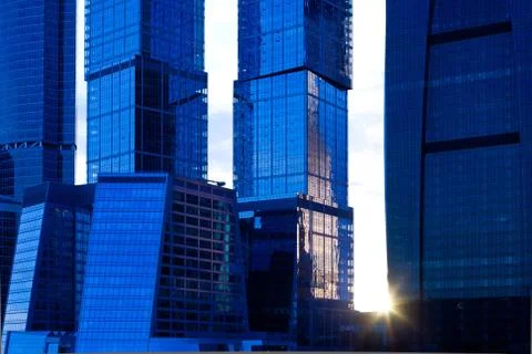 Sunset between skyscrapers Stock Photos