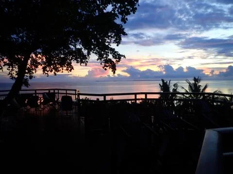 Sunset in between trees in Kokopo Stock Photos