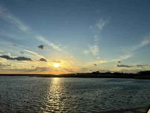 Sunset beyond the ripples Stock Photos