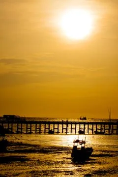 Sunset beyond the sea Stock Photos