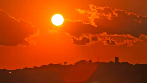 The Sunset Beyond the Townscape Video stock 327539752