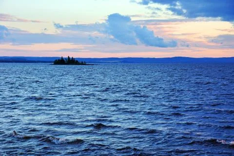 Sunset on big lake Stock Photos