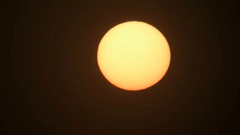 Sunset with big sun and cloudless sky, time lapse. Stock Footage 219716075