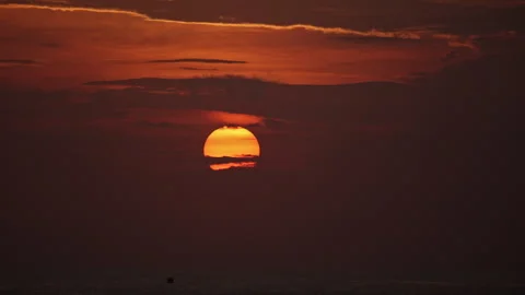 Sunset the Big sun goes down below the horizon Stock Footage 274781006