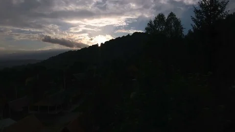 Sunset. black mountain, rain Stock Footage 77519455