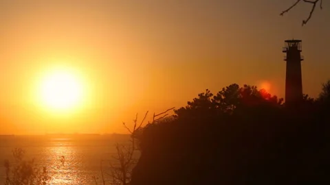 Sunset on the Black Sea Lighthouse The sun is low over the horizon Gelendzhik Stock Footage 150226493