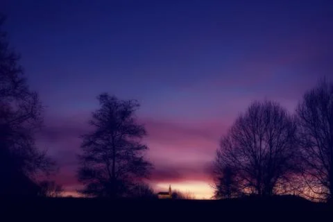 Sunset with black silhouette and dramatic sky Foto stock