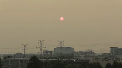 Sunset blocked by wildfire and forest fire smoke Stock Footage 157417240