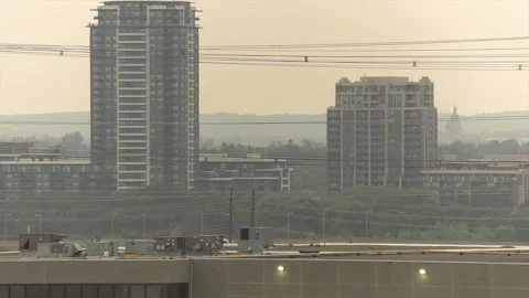 Sunset blocked by wildfire and forest fire smoke in the sky Stock Footage 157612451