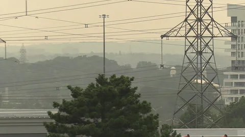 Sunset blocked by wildfire and forest fire smoke in the sky Stock Footage 157612837