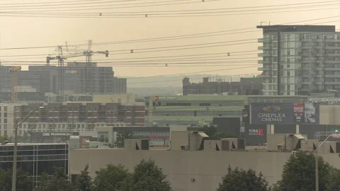 Sunset blocked by wildfire and forest fire smoke in the sky Stock Footage 157612932