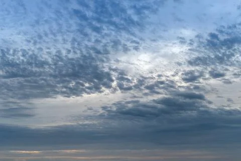 Sunset with blue fluffy cloudy sky, sunset background Stock-Fotos
