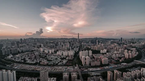 Sunset blue sky and white clouds in the sky of high-rise city Stock Footage 138783283