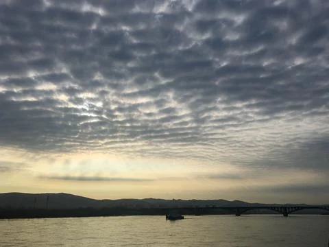 Sunset on blue sky. Blue sky with some clouds. blue sky clouds, summer skies Stock Photos