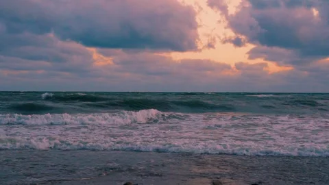 Sunset Blue Turquoise Sea Waves Sandy Beach Light Orange Sky Puffy Lilac Purple  Stock Footage 286430068