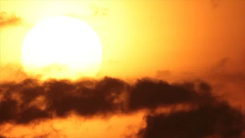 Sunset in blurred overcast sky Stock-Footage 136391298