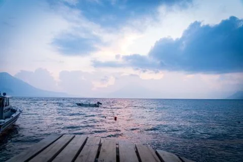 Sunset Boat Dock with Volcano in background Lake Atitlan, Guatemala 2 Stock Photos